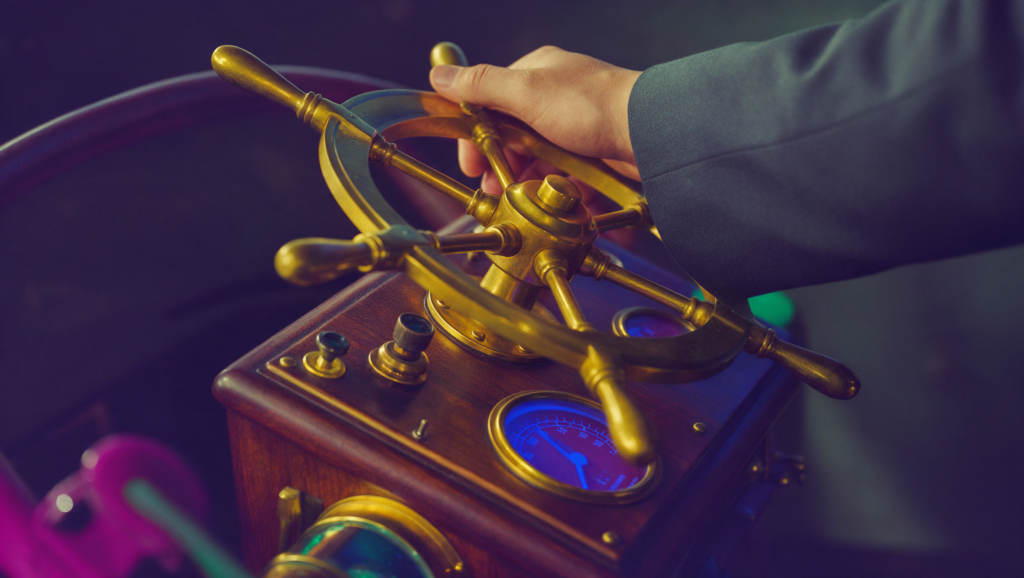 Hand adjusting a brass precision instrument
